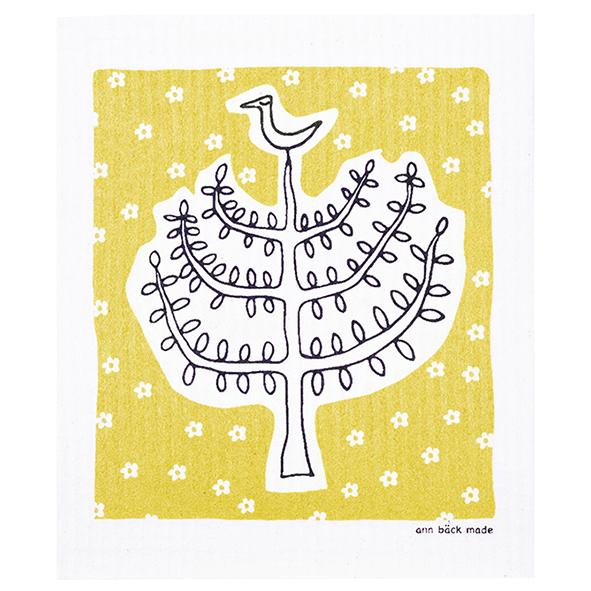 printed dishcloth, in yellow with a bird sitting on the top of a tree. tryckt disktrasa i gult med en fågel sittande i toppen av ett träd. painettu tiskirätti. 