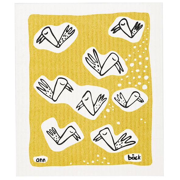 birdy nam nam. Yellow and black print on a eco-friendly dishcloth with birds. Tryckt disktrasa i gult och svart med flygande fåglar. Painettu tiskirätti, värit: keltainen  ja musta. Lintukuosi.