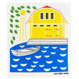 Printed dishcloth with a boathouse, rowing boat and the sea. Tryckt disktrasa med båthus, en roddbåt vid havet. Painettu tiskirätti missä venevaja ja soutuvene.